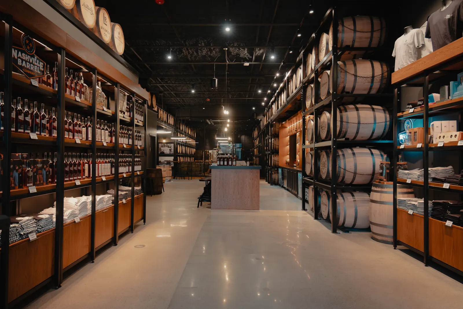 Inside the Louisville Rickhouse retail floor and tasting room, barrels racked to the ceiling