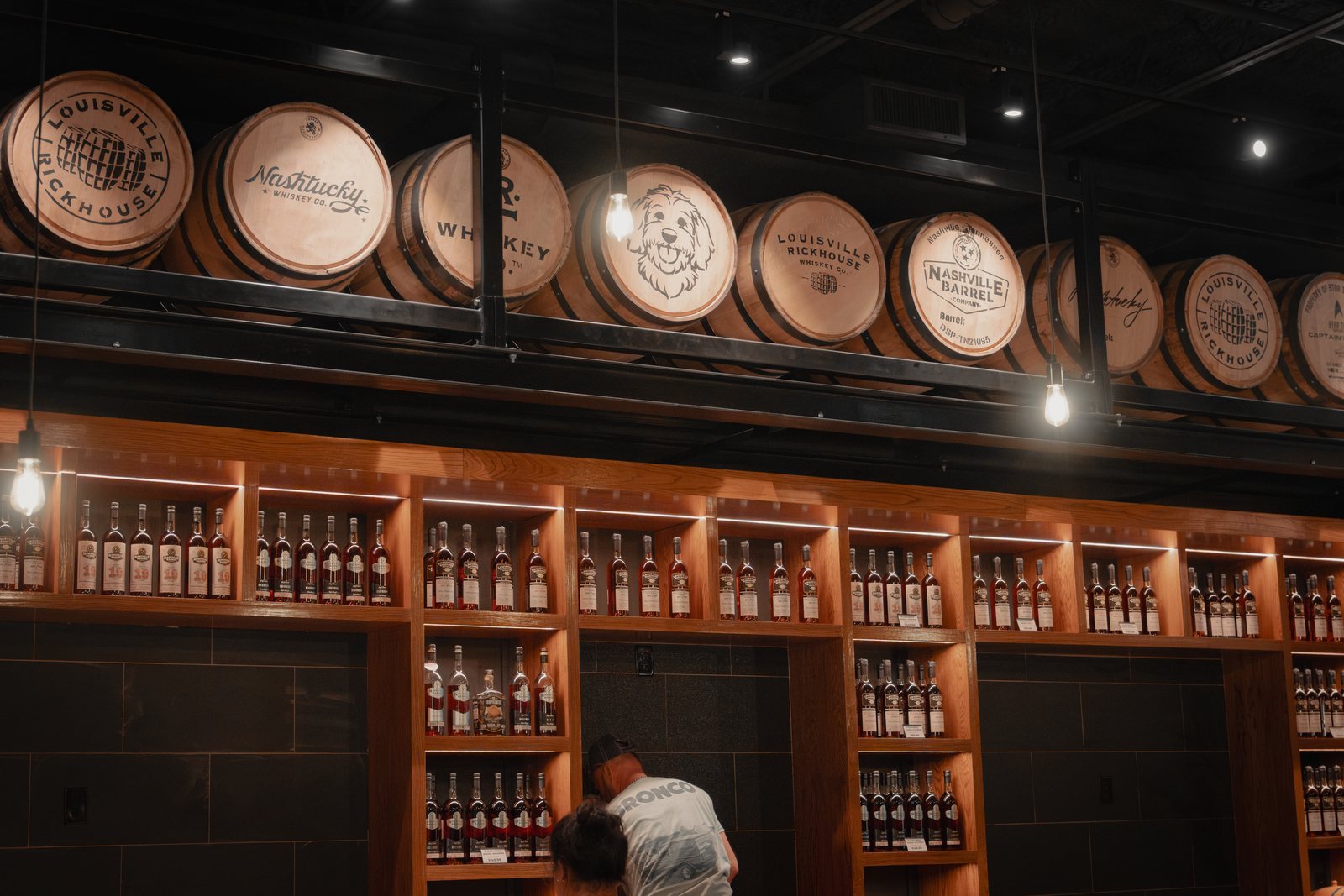 Barrel racks above the Louisville Rickhouse retail floor